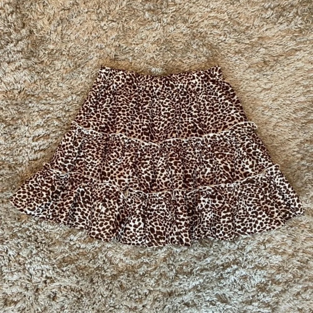 She in cheetah skirt